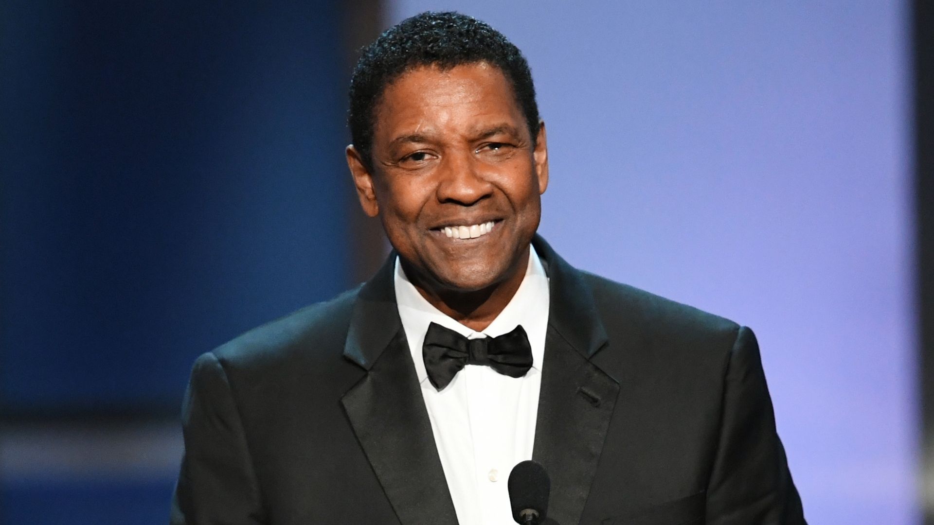 Denzel Washington em trajes finos